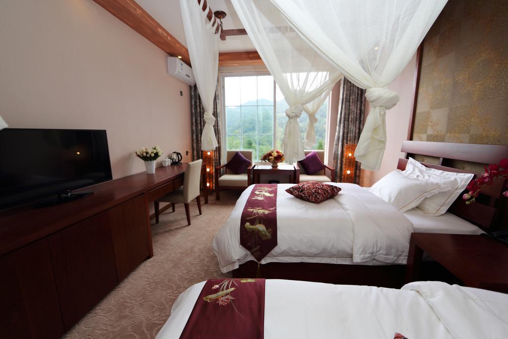 Panshan Tingquan Tuwo Holiday Resort Leshan Chambre photo