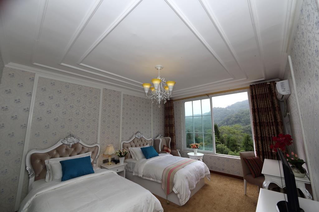 Panshan Tingquan Tuwo Holiday Resort Leshan Chambre photo