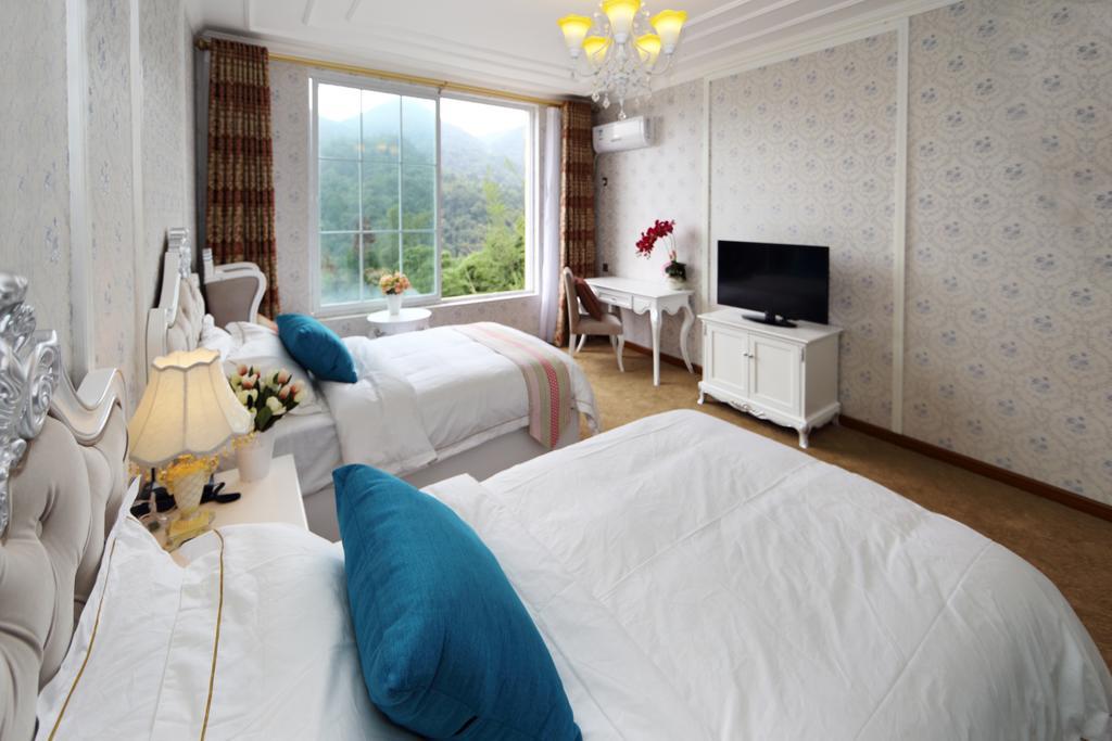 Panshan Tingquan Tuwo Holiday Resort Leshan Chambre photo